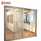 Алюминиевые закаленные стеклянные ролики раздвижной двери размера раздвижной двери входа коммерчески подгонянные алюминиевые сползая двери сетки